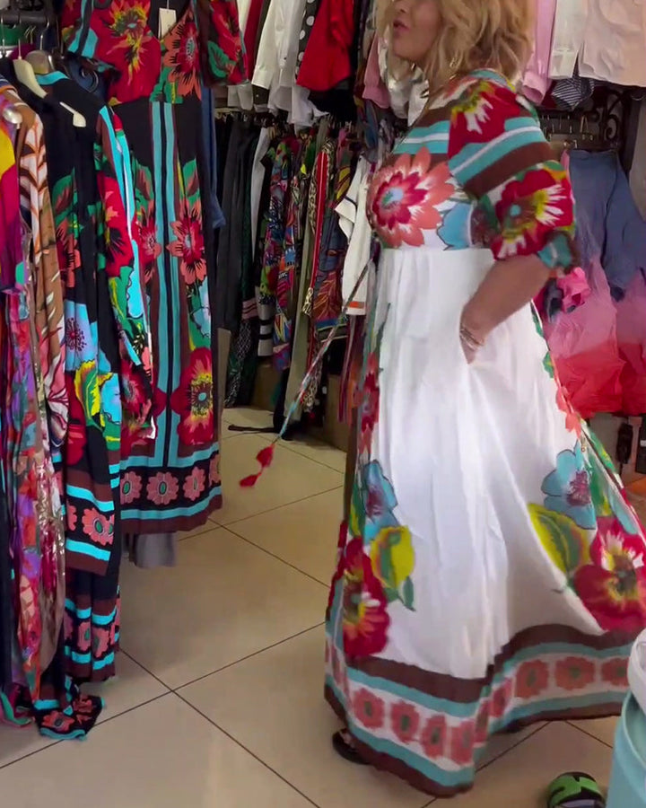 Nerijaa – Sukienka w Kwiaty z Głębokim Dekoltem w Kształcie Litery V