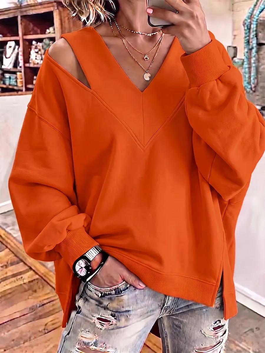 Kirstan – Elegancka Bluza Oversize z Wycięciem i Dekoltem w Kształcie Litery V