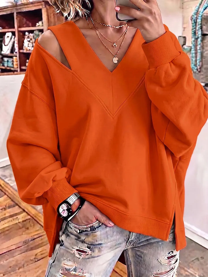 Kirstan – Elegancka Bluza Oversize z Wycięciem i Dekoltem w Kształcie Litery V