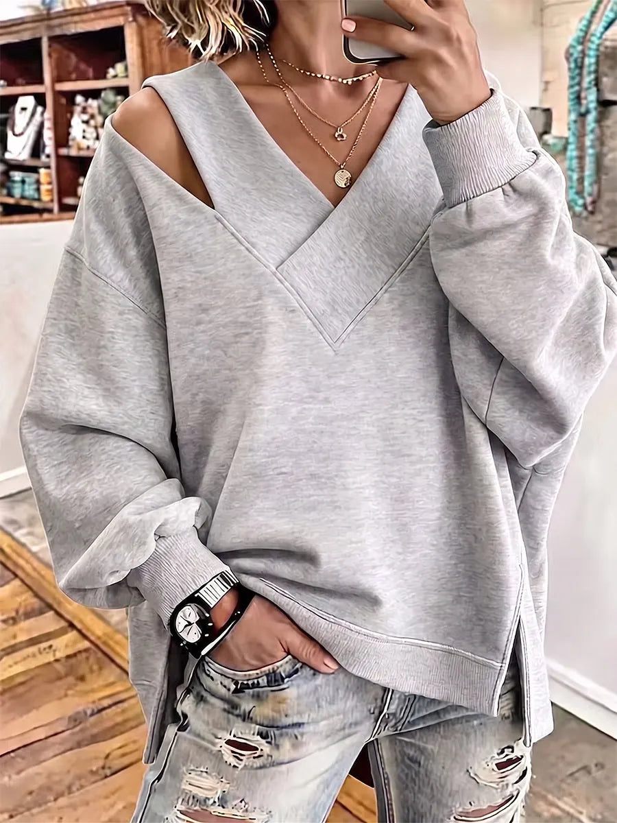 Kirstan – Elegancka Bluza Oversize z Wycięciem i Dekoltem w Kształcie Litery V